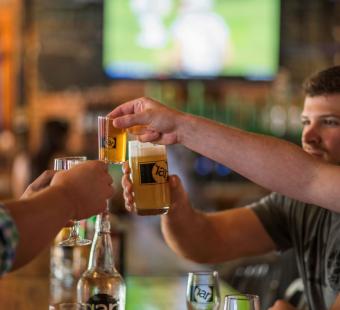 RAR Brewing Friends Toasting