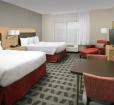 Guest room at TownePlace Suites Photo