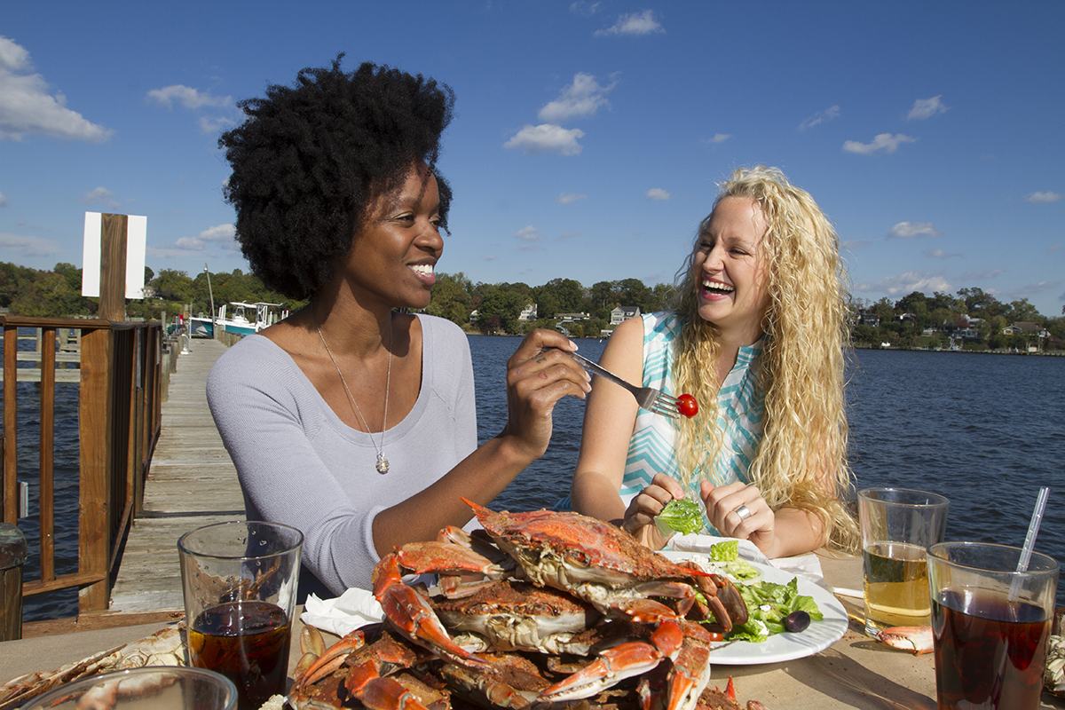 Women enjoying crabs