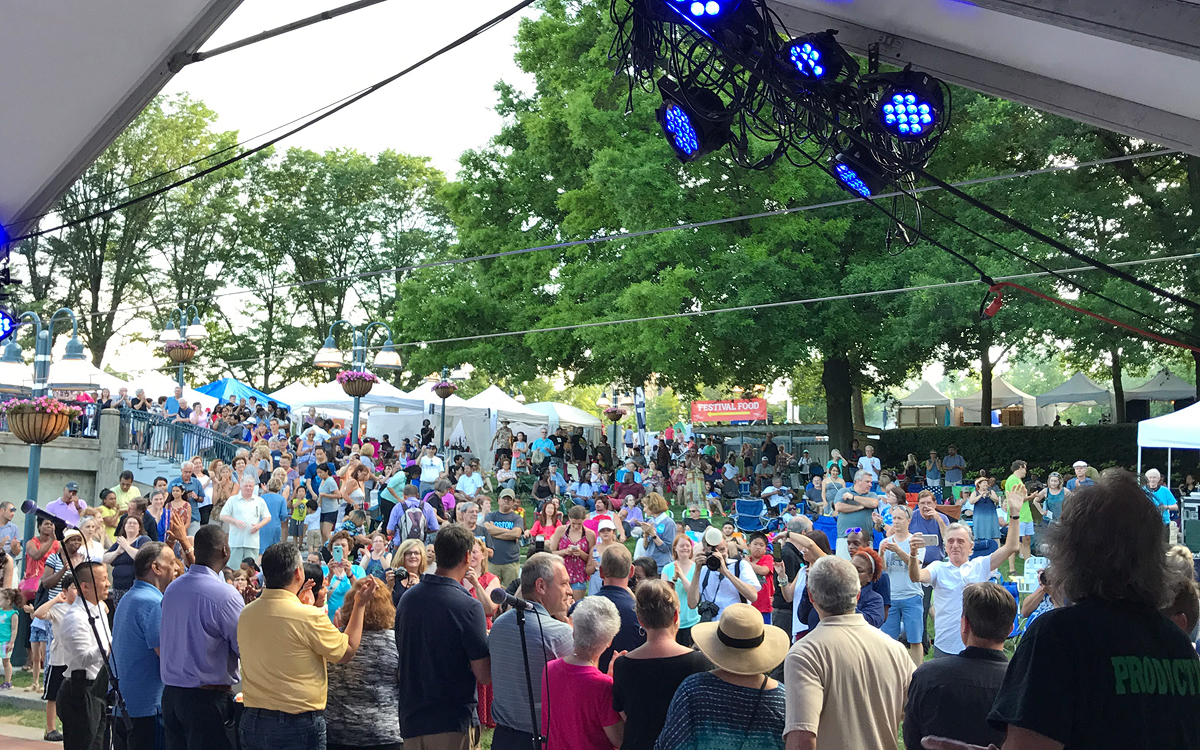 A crowd listening to music performers at the Columbia Festval of the Arts