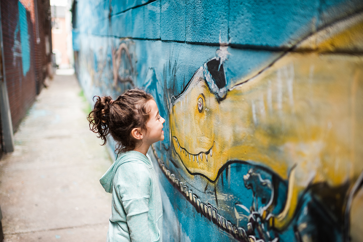 A Young Girl Makes A New Friend on the Public Art Trail 