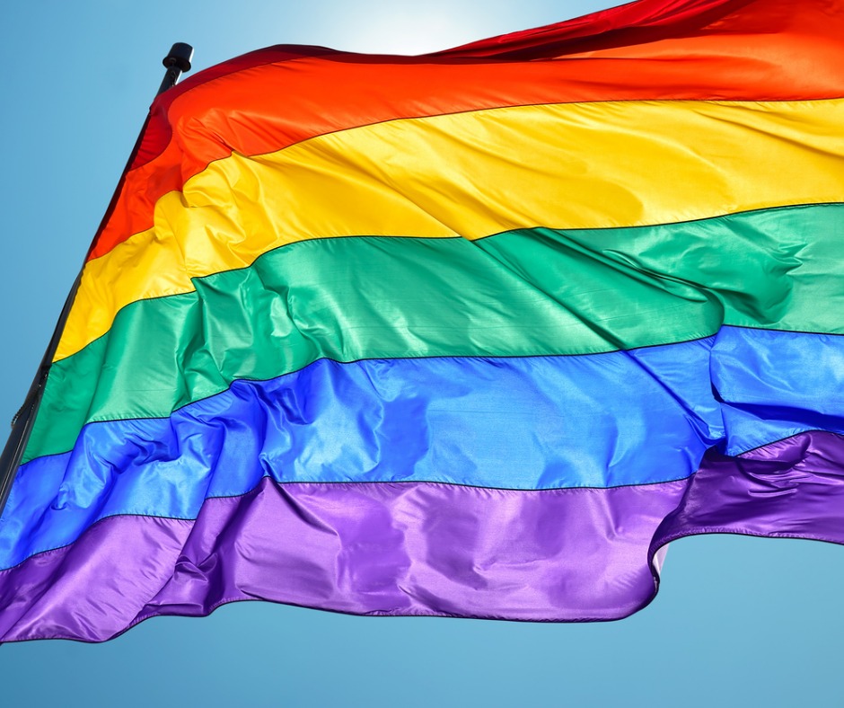 Rainbow flag and blue sky