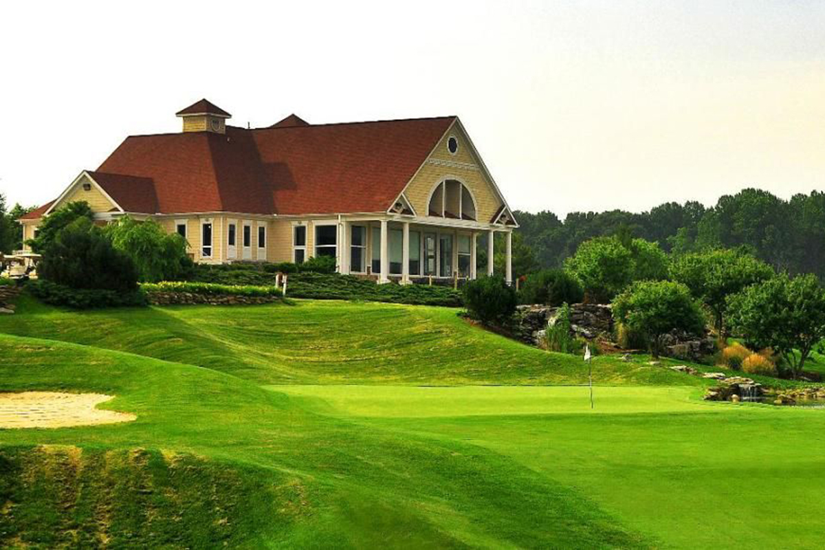 The Club House and a green at the P.B Dye Golf Course