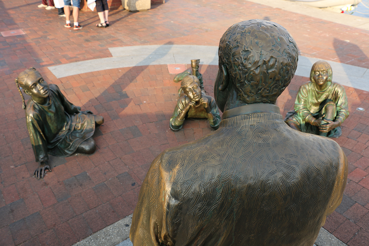 The Kunta Kinte-Alex Haley Memorial portrays the triumph of the human spirit and commemorates the arrival place of enslaved Africans, especially Kunta Kinte.