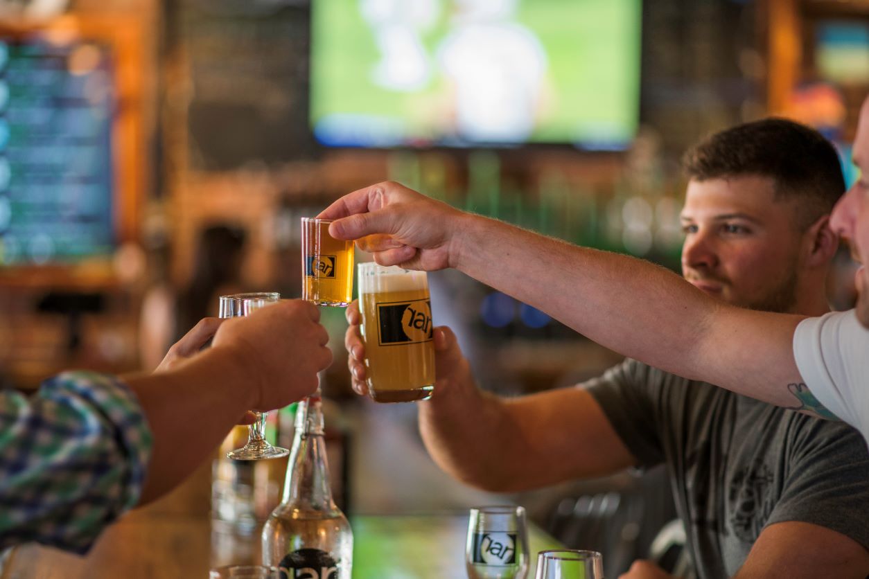 RAR Brewing Friends Toasting