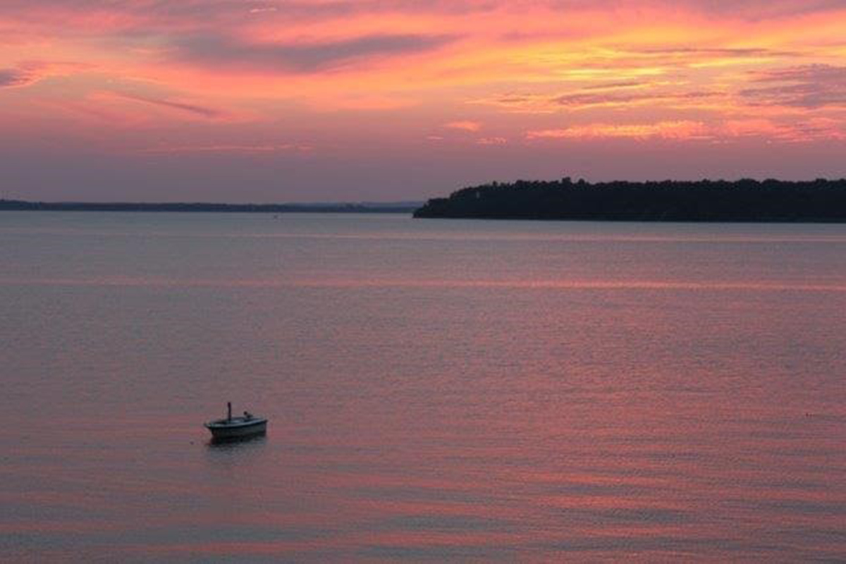 Crystal Beach at Sunset with Boat