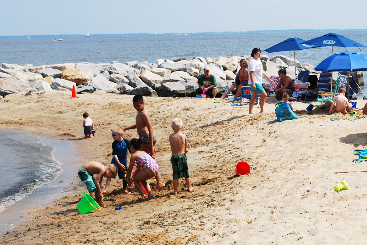 Kids playing in the sand at Mayo Beach Park
