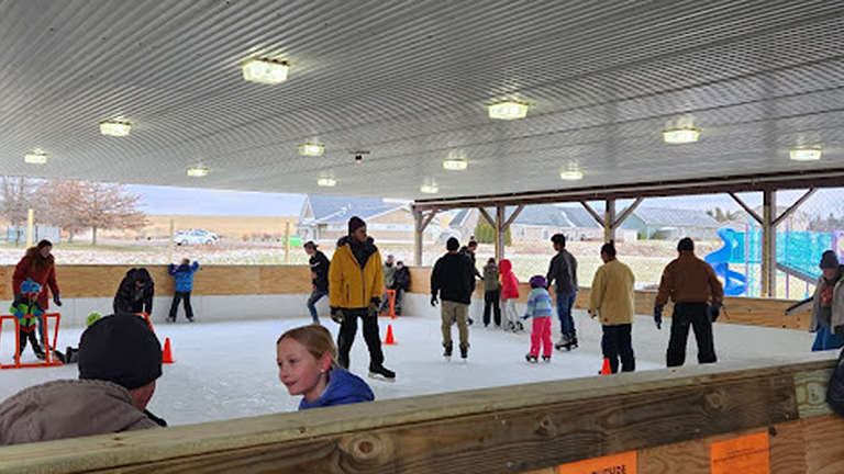 People ice skating at the JTF Ice Rink in Grantsville, Md.