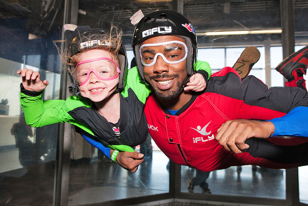 Image of people indoor skydiving