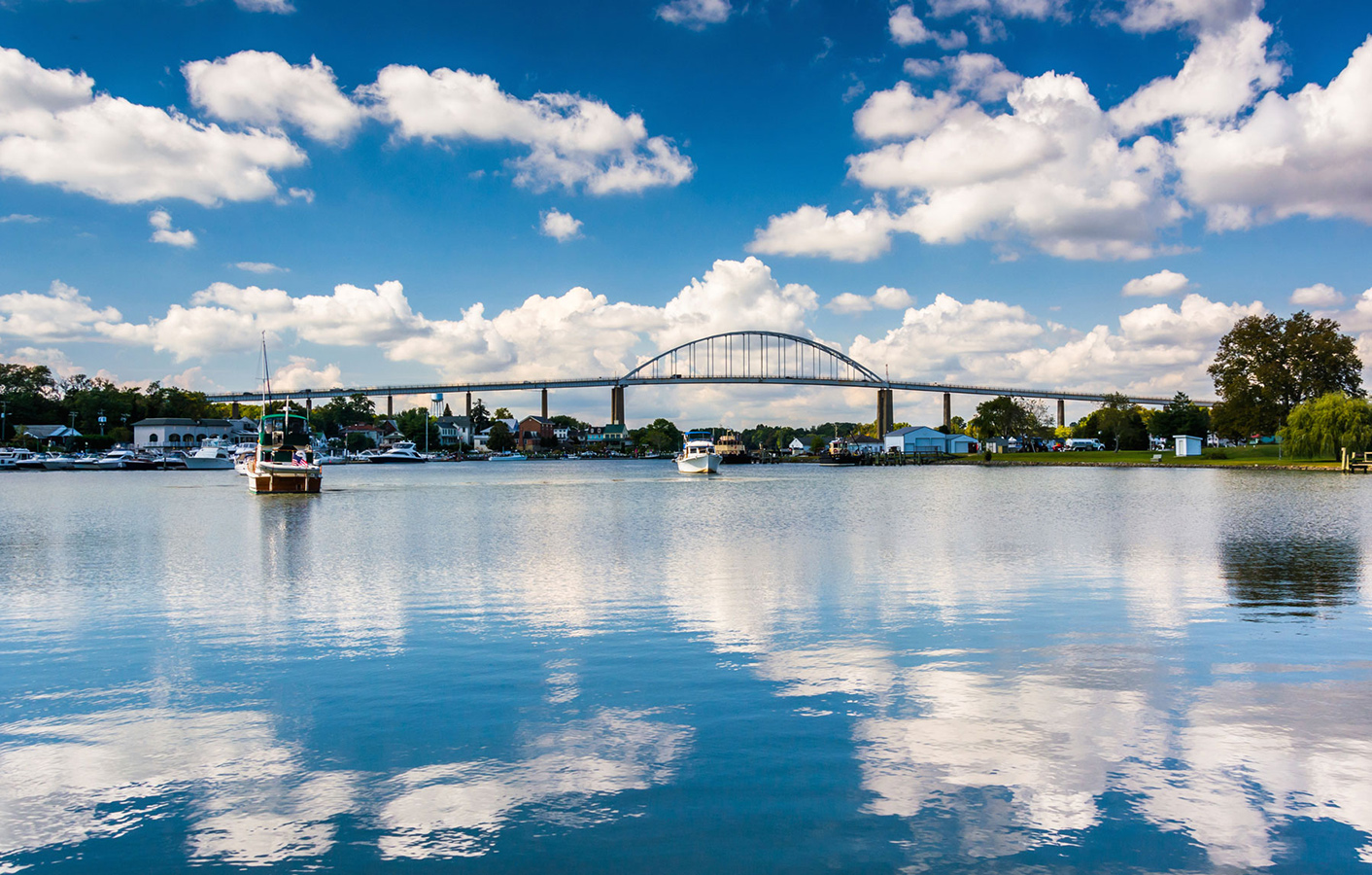 The Chesapeake City Bridge crosses over the C&amp;D Canal and provides views of the city below.