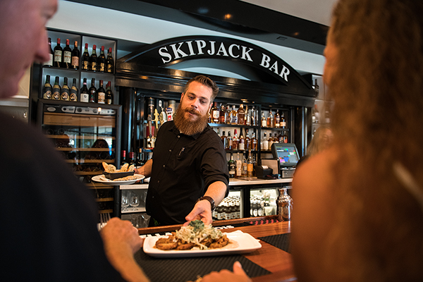 Bartender serving drinks