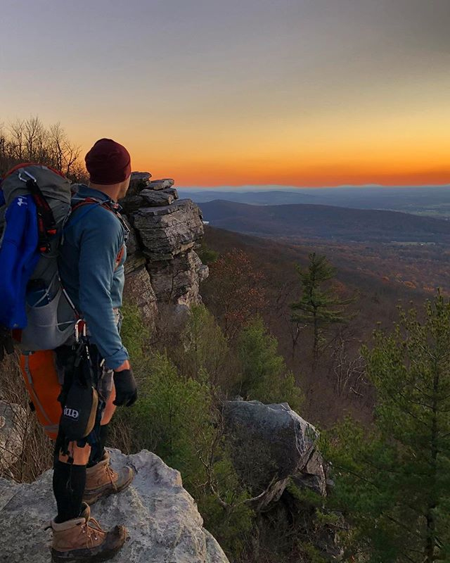 hiker at a hilltop
