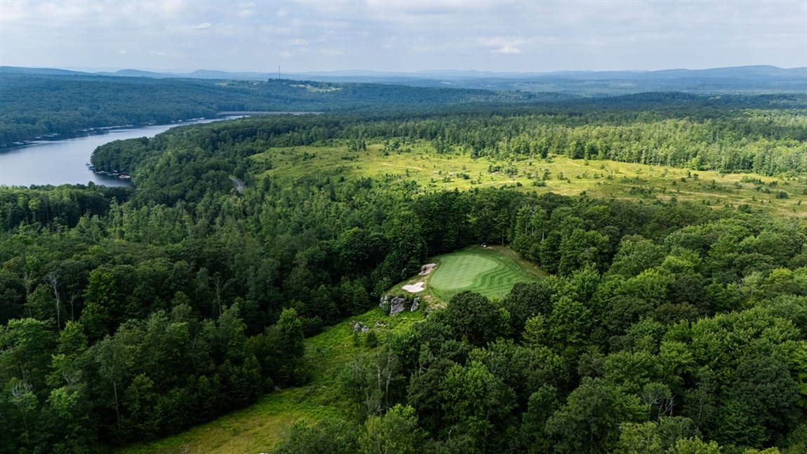 Overview of Lodestone Golf Course with Deep Creek Lake in the background Photo