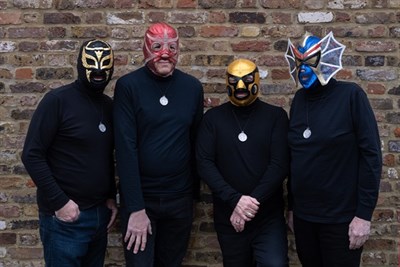 four people in lucha masks Photo