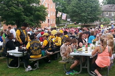 People enjoying all the corn they can eat! Photo