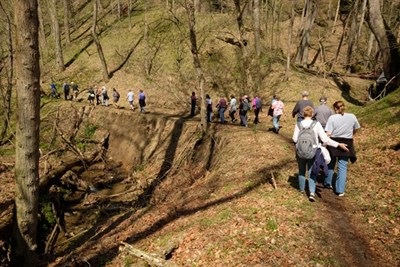 Hikers on a hilly path.  Photo