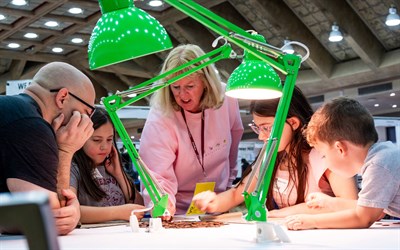 Attendees enjoying the Kids Nook at the Whitman Expos Coin Show Photo