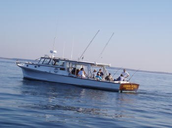 The Stormy Petrel with fishermen trolling for Rockfish. Photo