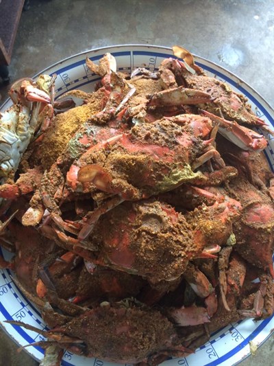 Enjoying crabs ast Strongs Bay Seafood Inc Photo