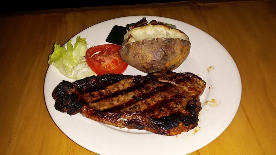 Steal and baked potato Photo