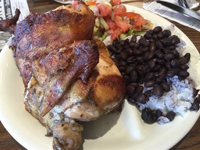 1/2 chicken with cucumber salad and rice-n-beans from Don Pollo Photo