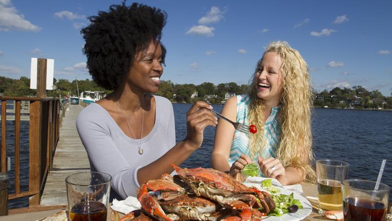 Women enjoying crabs