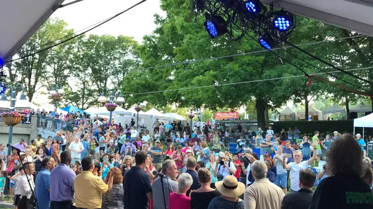 A crowd listening to music performers at the Columbia Festval of the Arts