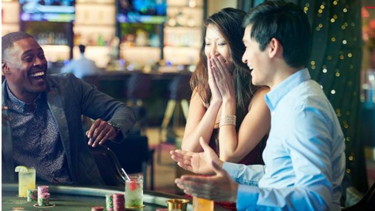 People at casino table games