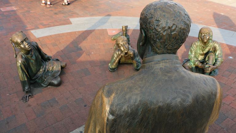The Kunta Kinte-Alex Haley Memorial portrays the triumph of the human spirit and commemorates the arrival place of enslaved Africans, especially Kunta Kinte.