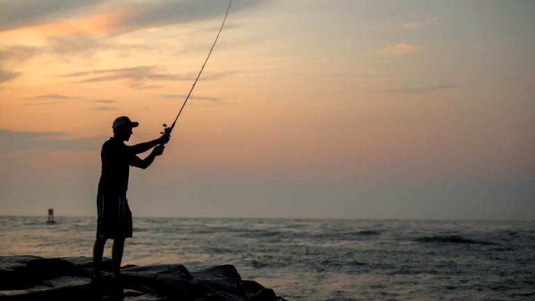 Man Fishing in Ocean City