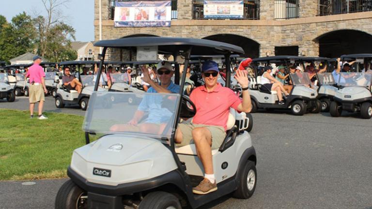 Golfers in a Golf Cart