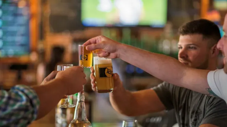 RAR Brewing Friends Toasting