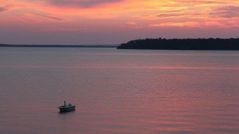 Crystal Beach at Sunset with Boat