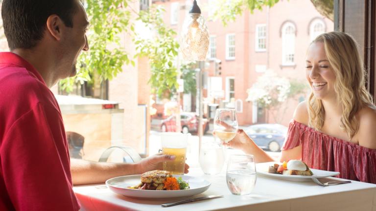 couple eating dinner in Downtown Frederick