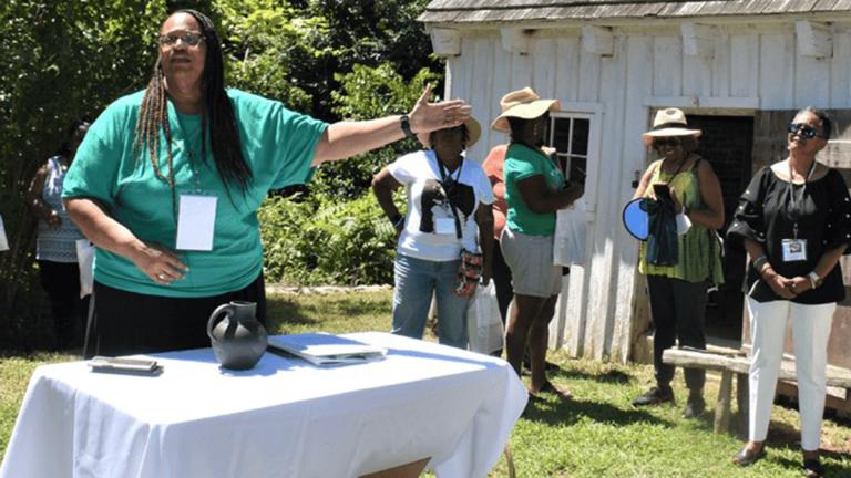 Historic Sotterley Board Vice President, Gwen Bankins, addressing visitors during 2022's Day of Unity and Healing event