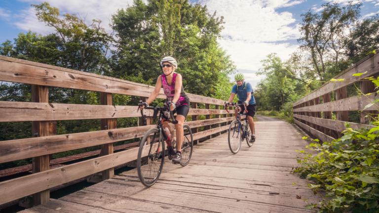 Couple biking on the Great Allegheny Passage