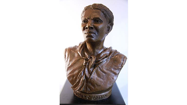 A brown colored bust of Harriet Tubman