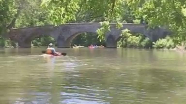Gentleman kayaking by the Burnside Bridge