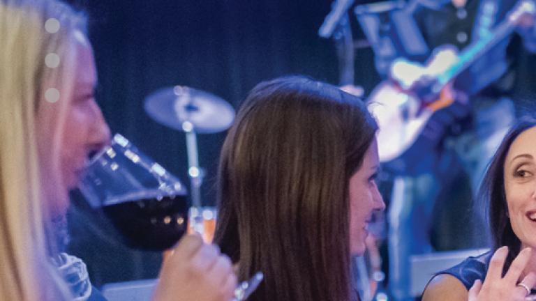 women dining with music