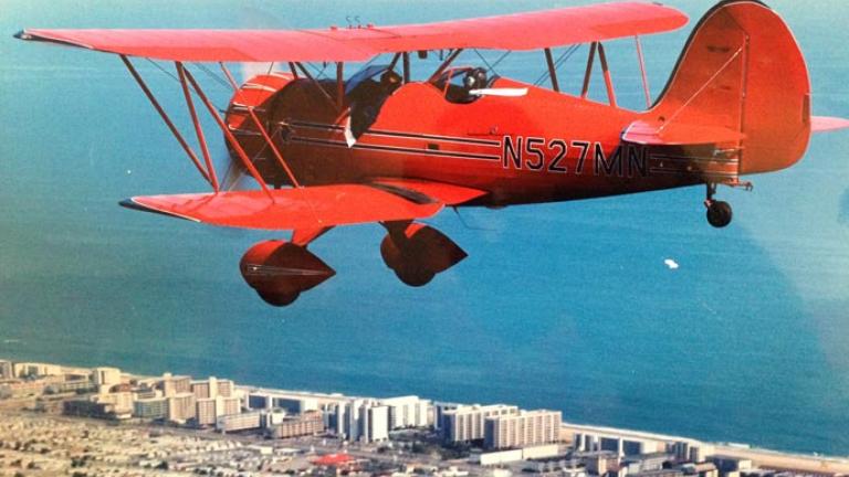 Plane flying over OC