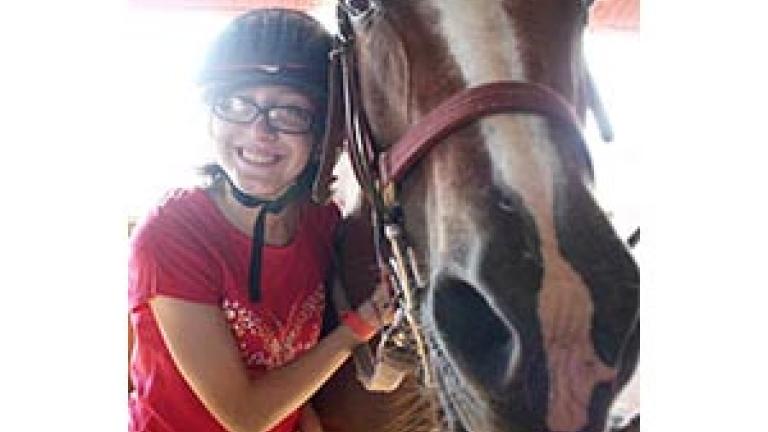 Rider with a horse at River Valley Ranch