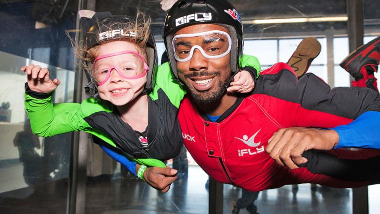 Image of people indoor skydiving