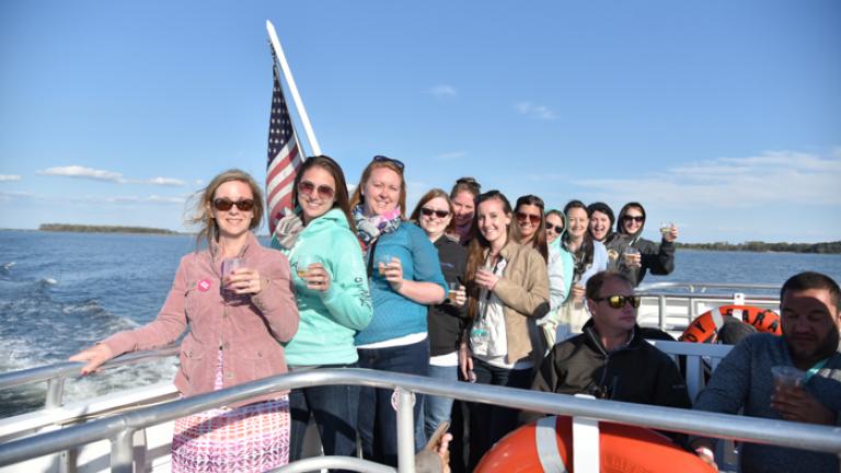 People on a boat crossing the bay to St. Michaels