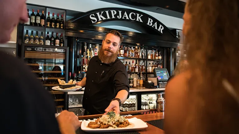 Bartender serving drinks