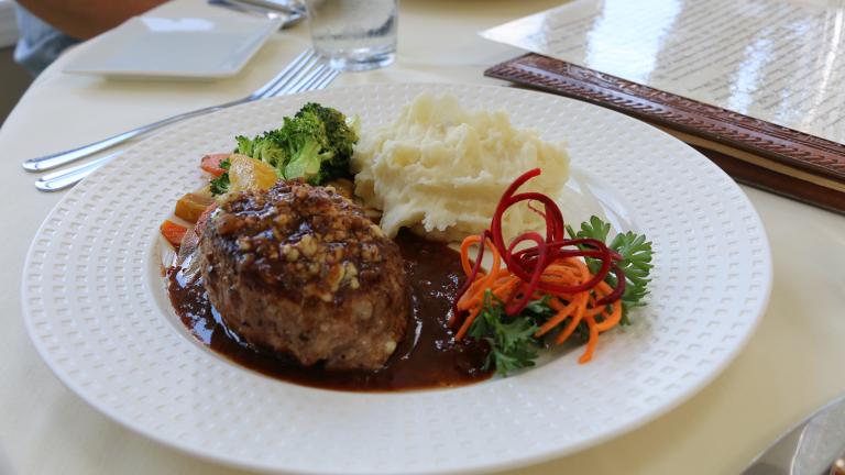 Fine Dining with food served on a white tablecloth
