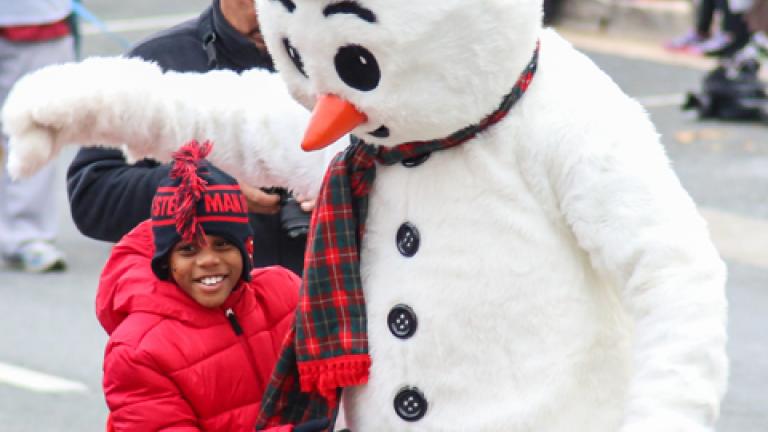 Boy with Frosty the Snowman