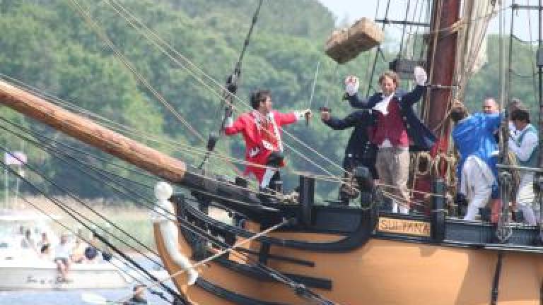 reenactors on ship