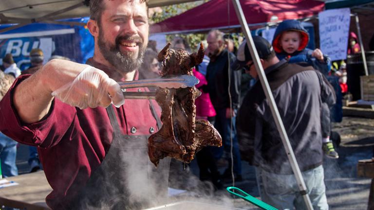 man frying muskrat