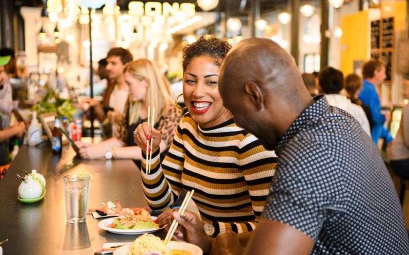 A couple enjoying eating together