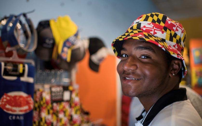 young boy with Maryland flag hat